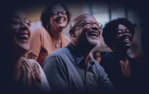 Community Education - Empowering AI Learning for All A group of people engaging in a workshop or class focused on AI education.